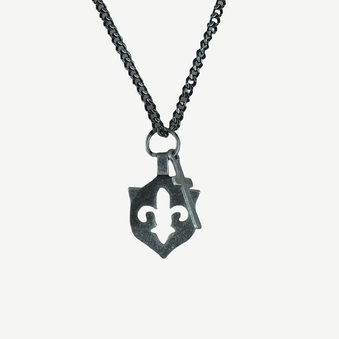 Fleur De Lis and Cross Amulet Necklace — finished light background #F5F5F3 — source image 1